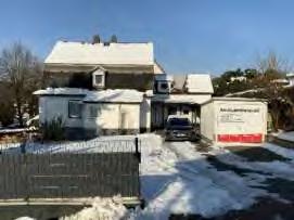 Wohnhaus mit Anbau und einer Fertiggarage