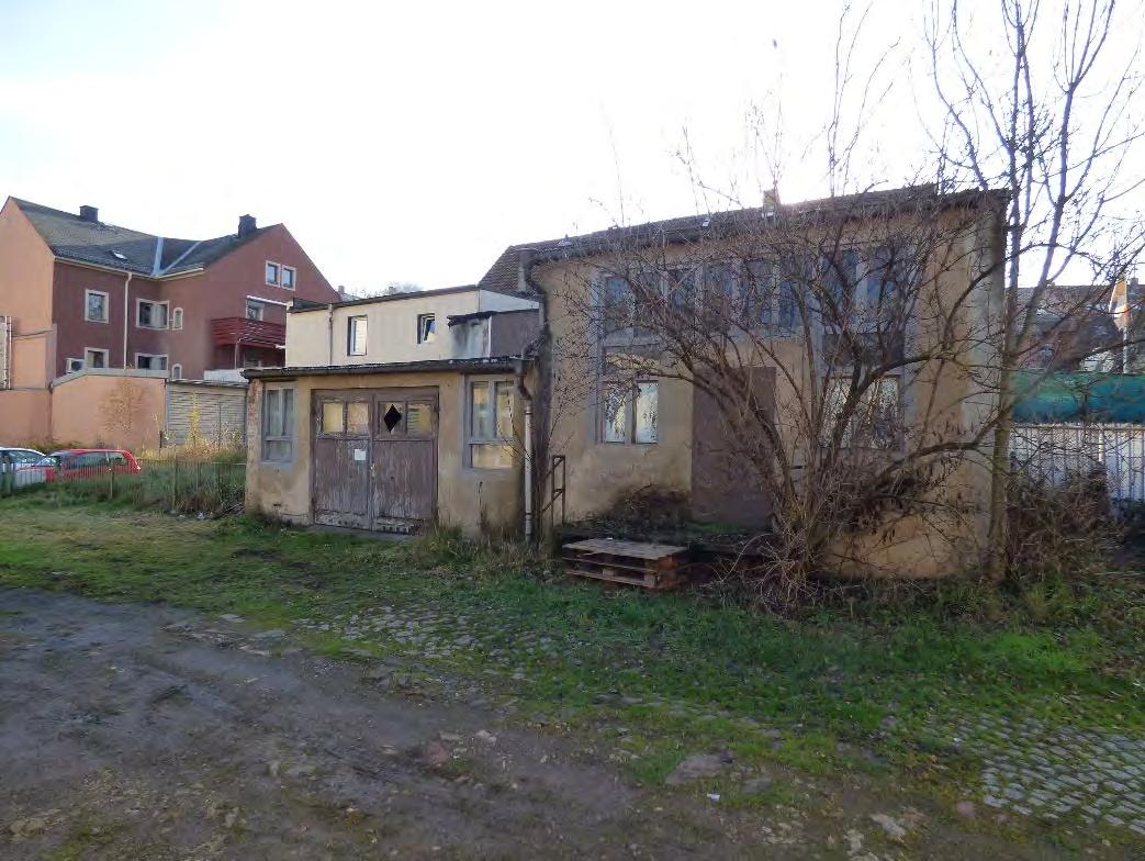 Grundstück mit baufälligen Schuppen/ehem. Werkstattgebäuden bebaut
