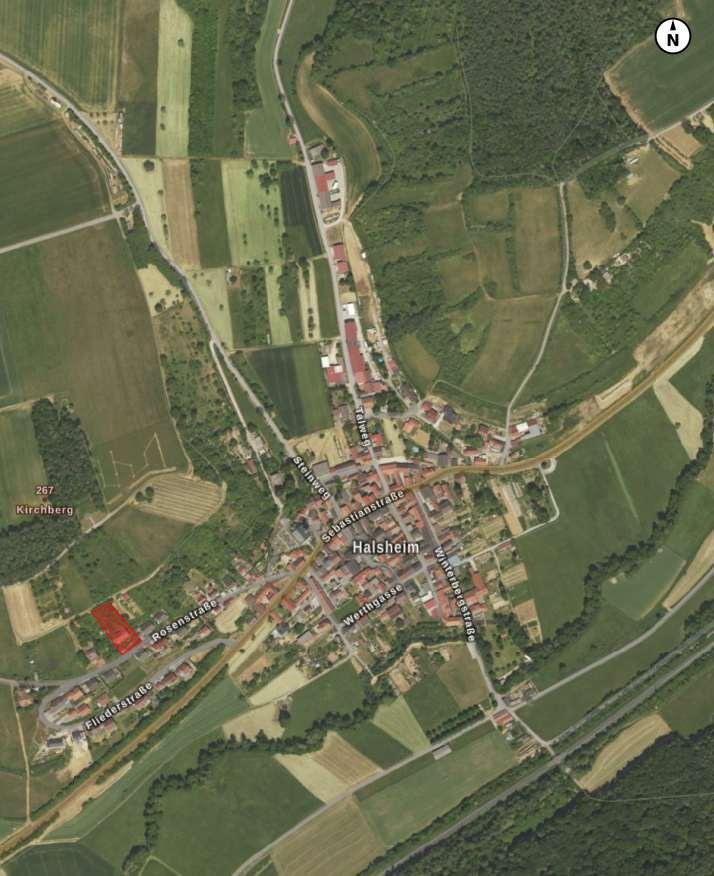 unbebautes Grundstück sowie Wohnungen in Mehrfamilienhaus