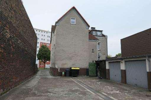 Wohn-/Geschäftshaus, Garage, Mehrfamilienhaus