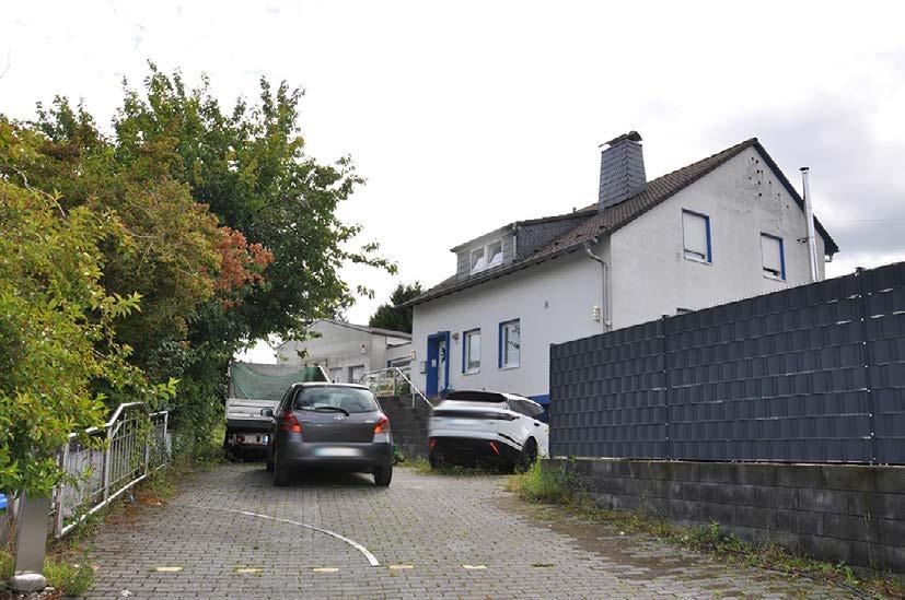 Kfz-Stellplatz, Gewerbeeinheit (z.B. Laden, Büro), Garage, Einfamilienhaus